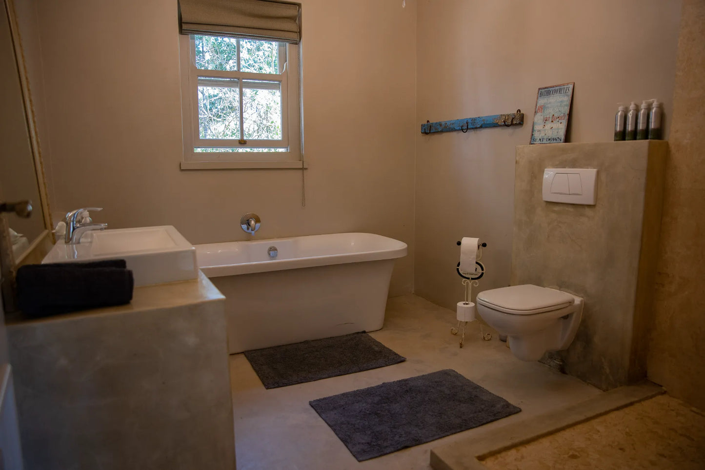 Peacehaven Cottage, a luxurious holiday home on the banks of the Breede River with a grand farmhouse feel. The property includes a spacious Manor House sleeping 8 guests and two stylishly converted Boat Sheds, each accommodating 2 guests.