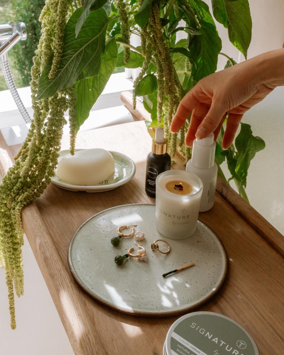 Pebble-shaped natural soap resting in a minimalist soap dish. Infused with pure essential oils like Neroli, Vetiver, and Lemon Verbena, the soap lathers richly while moisturizing the skin. A luxurious, SLS-, paraben-, and palm oil–free blend with a perfume-like scent.