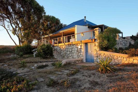 Whalesong Beach Cottage nestled in the heart of Churchhaven, a secluded fishing village within the pristine West Coast National Park. Sleeps 9.