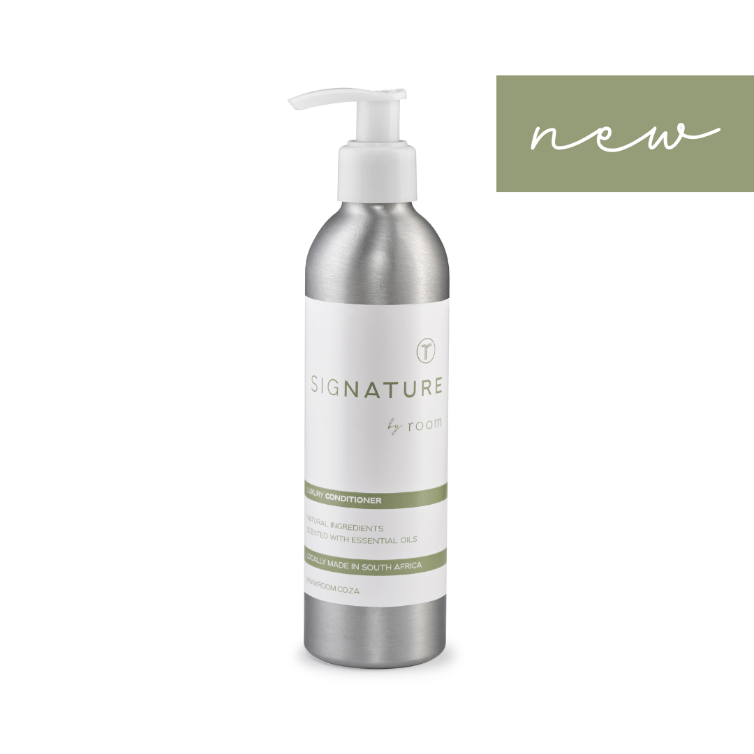 "sigNATURE natural conditioner, infused with pure essential oils for a perfume-like scent. Luxuriously hydrating and locally crafted, this nourishing formula leaves hair soft, smooth, and naturally scented — free from SLS, parabens, and palm oil.