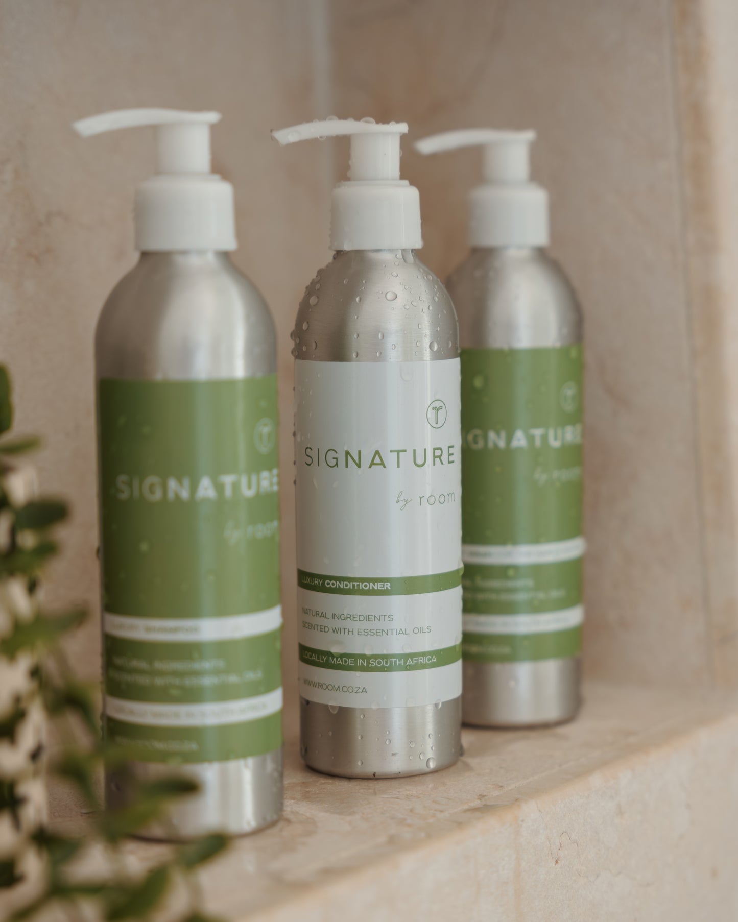 "sigNATURE natural conditioner, infused with pure essential oils for a perfume-like scent. Luxuriously hydrating and locally crafted, this nourishing formula leaves hair soft, smooth, and naturally scented — free from SLS, parabens, and palm oil.