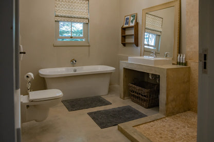 Peacehaven Cottage, a luxurious holiday home on the banks of the Breede River with a grand farmhouse feel. The property includes a spacious Manor House sleeping 8 guests and two stylishly converted Boat Sheds, each accommodating 2 guests.