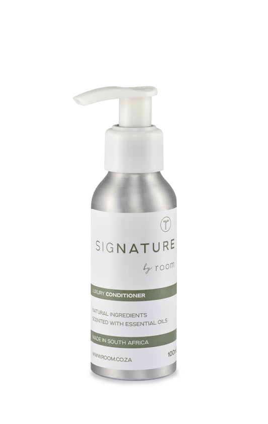 "sigNATURE natural conditioner, infused with pure essential oils for a perfume-like scent. Luxuriously hydrating and locally crafted, this nourishing formula leaves hair soft, smooth, and naturally scented — free from SLS, parabens, and palm oil.
