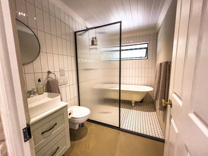 Witteboomen Forest Cottage nestled in the heart of the lush Constantia Winelands comfortably accommodating up to 8 guests across 4 bedrooms.