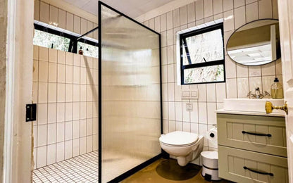 Witteboomen Forest Cottage nestled in the heart of the lush Constantia Winelands comfortably accommodating up to 8 guests across 4 bedrooms.