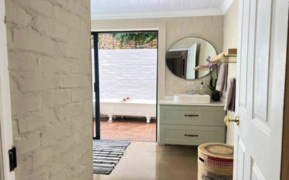 Witteboomen Forest Cottage nestled in the heart of the lush Constantia Winelands comfortably accommodating up to 8 guests across 4 bedrooms.