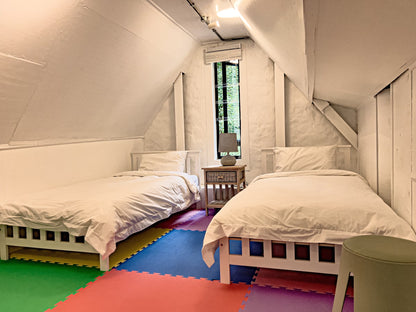 Witteboomen Forest Cottage nestled in the heart of the lush Constantia Winelands comfortably accommodating up to 8 guests across 4 bedrooms.