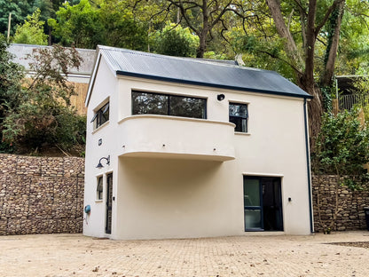 Witteboomen Forest Cottage nestled in the heart of the lush Constantia Winelands comfortably accommodating up to 8 guests across 4 bedrooms.