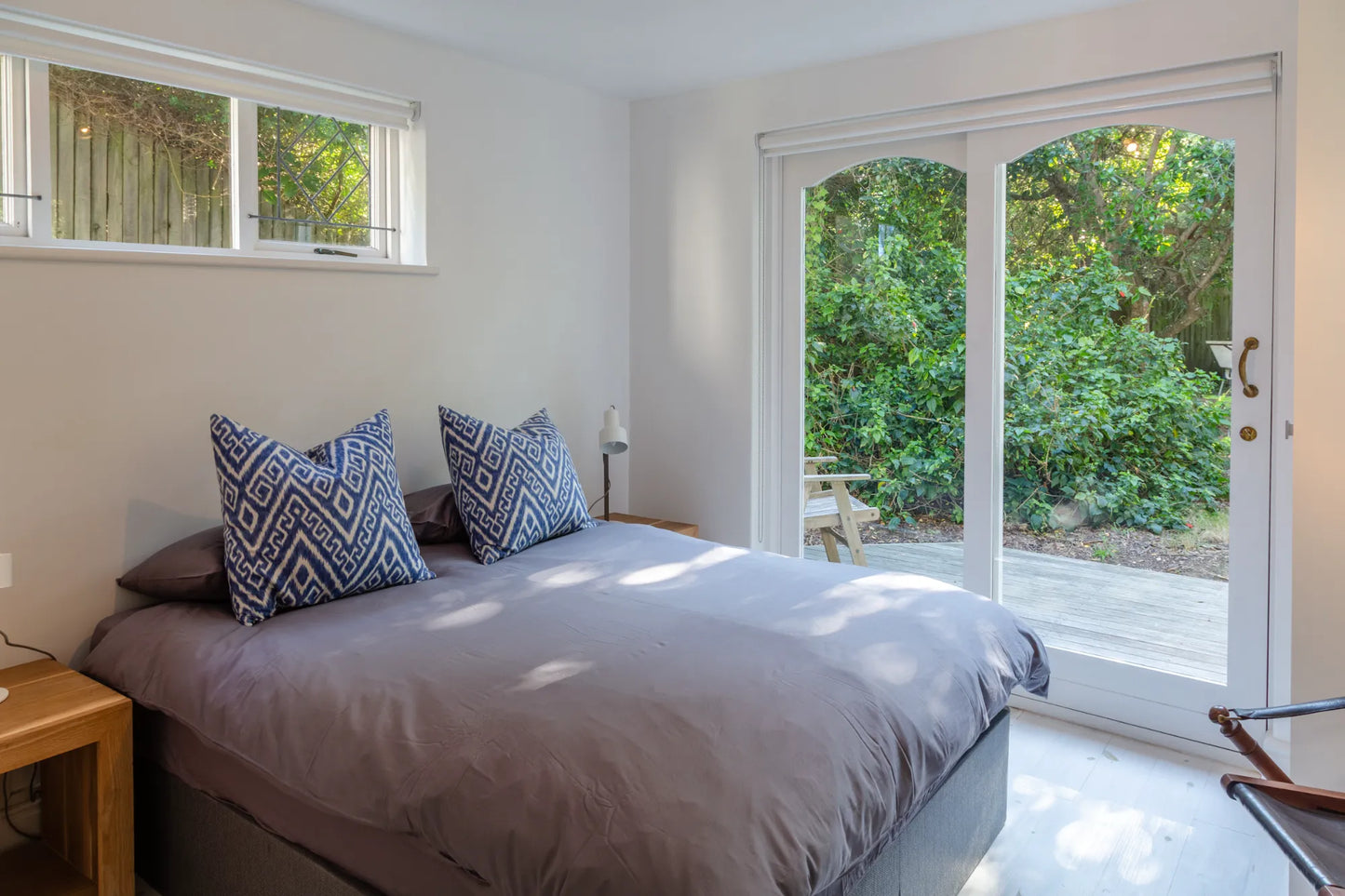 Candlewood Cottage, a thatched holiday villa in St. Francis Bay nestled among Candlewood trees. A serene self-catering retreat sleeping up to 8 guests, featuring elegant, pared-down interiors, a cosy loft with its own TV and kitchenette, and easy access to canals and the beach.