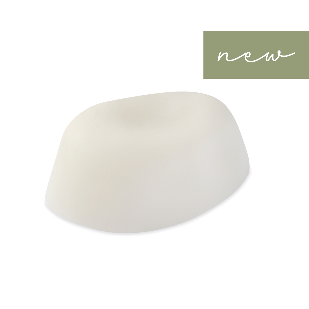 Natural pebble-shaped soap handcrafted with pure essential oils—Neroli, Vetiver, Lemon Verbena, Bitter Orange, and Frankincense. Creates a rich, moisturizing lather with a perfume-like scent. SLS, paraben, and palm oil free.