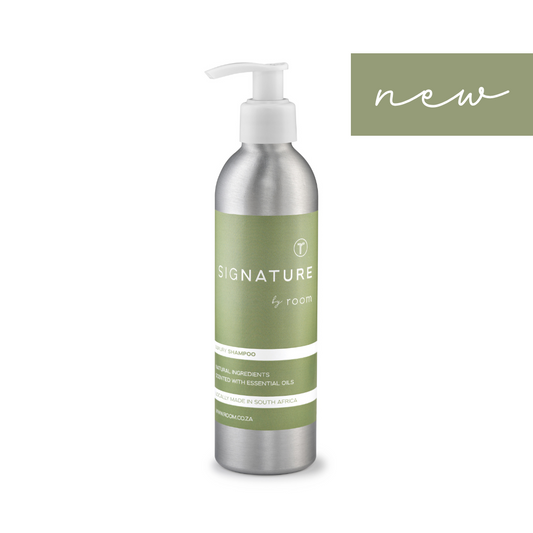 sigNATURE natural shampoo, crafted with pure essential oils for a luxurious, perfume-like scent. Lightweight and nourishing, it gently cleanses while leaving hair refreshed and naturally fragranced. Locally made and free from SLS, parabens, and palm oil.